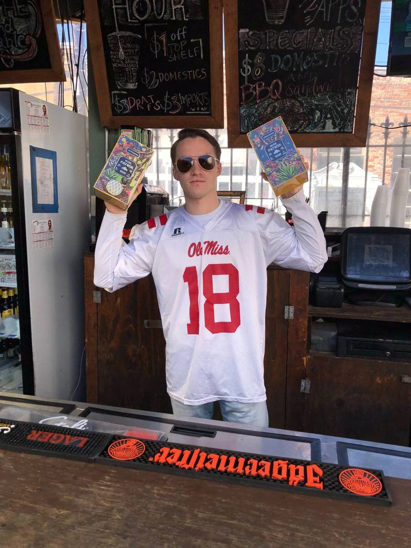 A fan in an Ole Miss jersey at Round Table