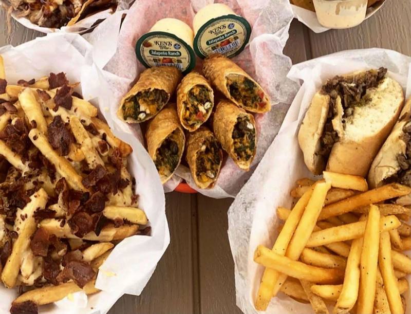 Bacon cheese fries, Southwestern rolls and a cheesesteak